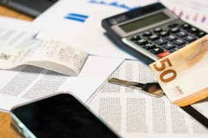 dm-harmonics-wohlstand-beginnt-im-kopf-geld-taschenrechner-kassezettel
